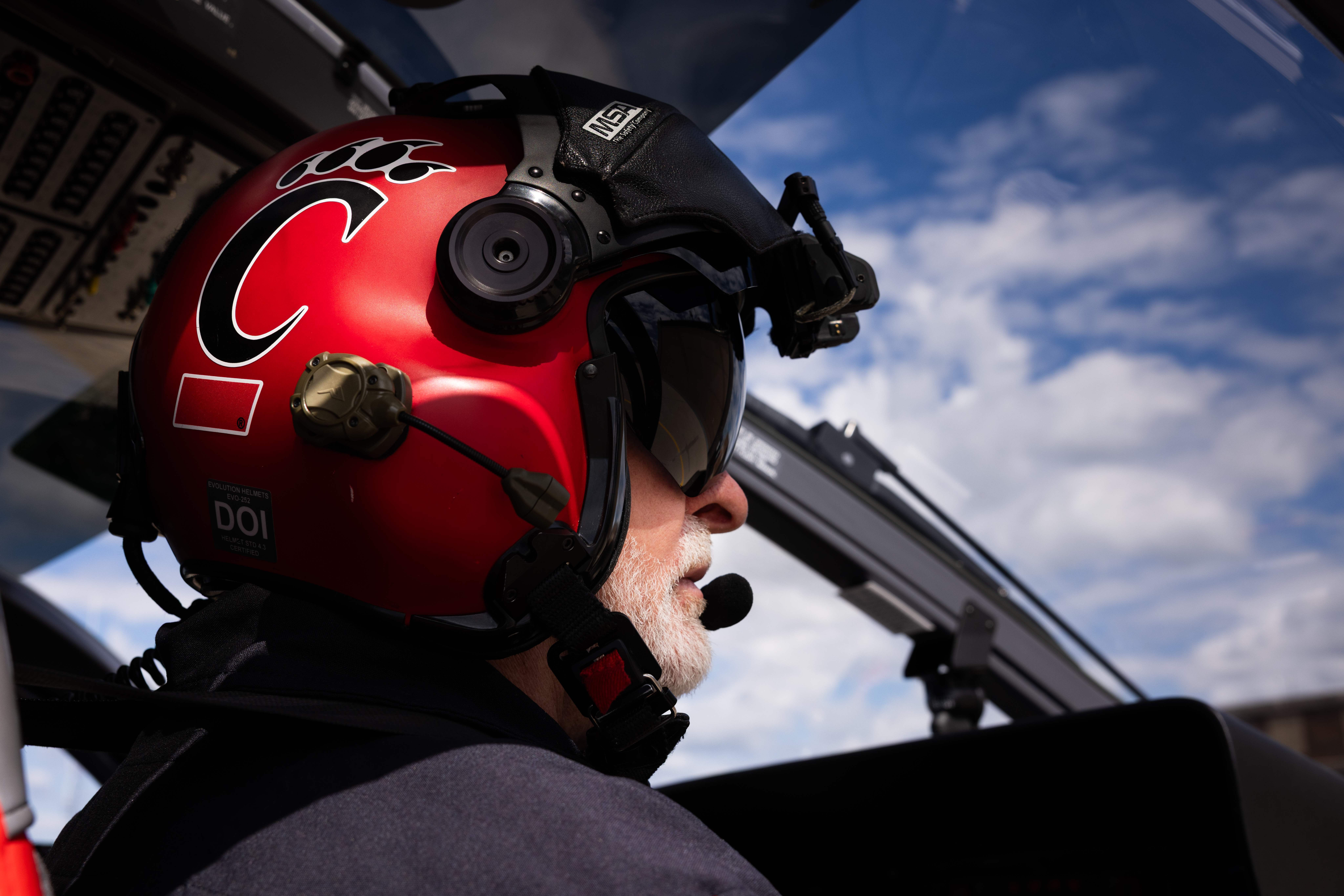 Air Care pilot preparing for take off from the UCMC helipad.