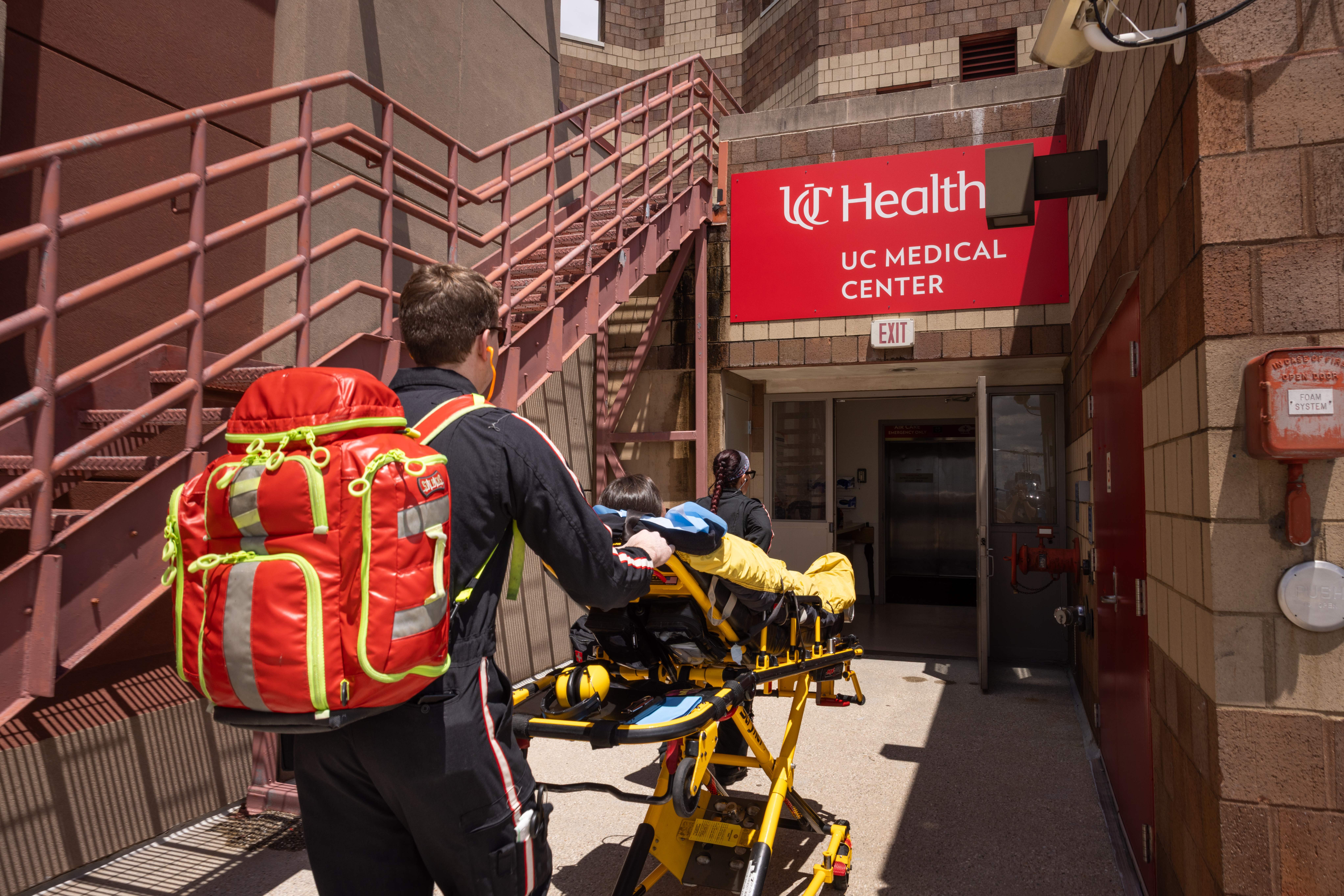 UC Health Air Care team entering UCMC to bring a patient to receive care in our Level I Trauma Center.