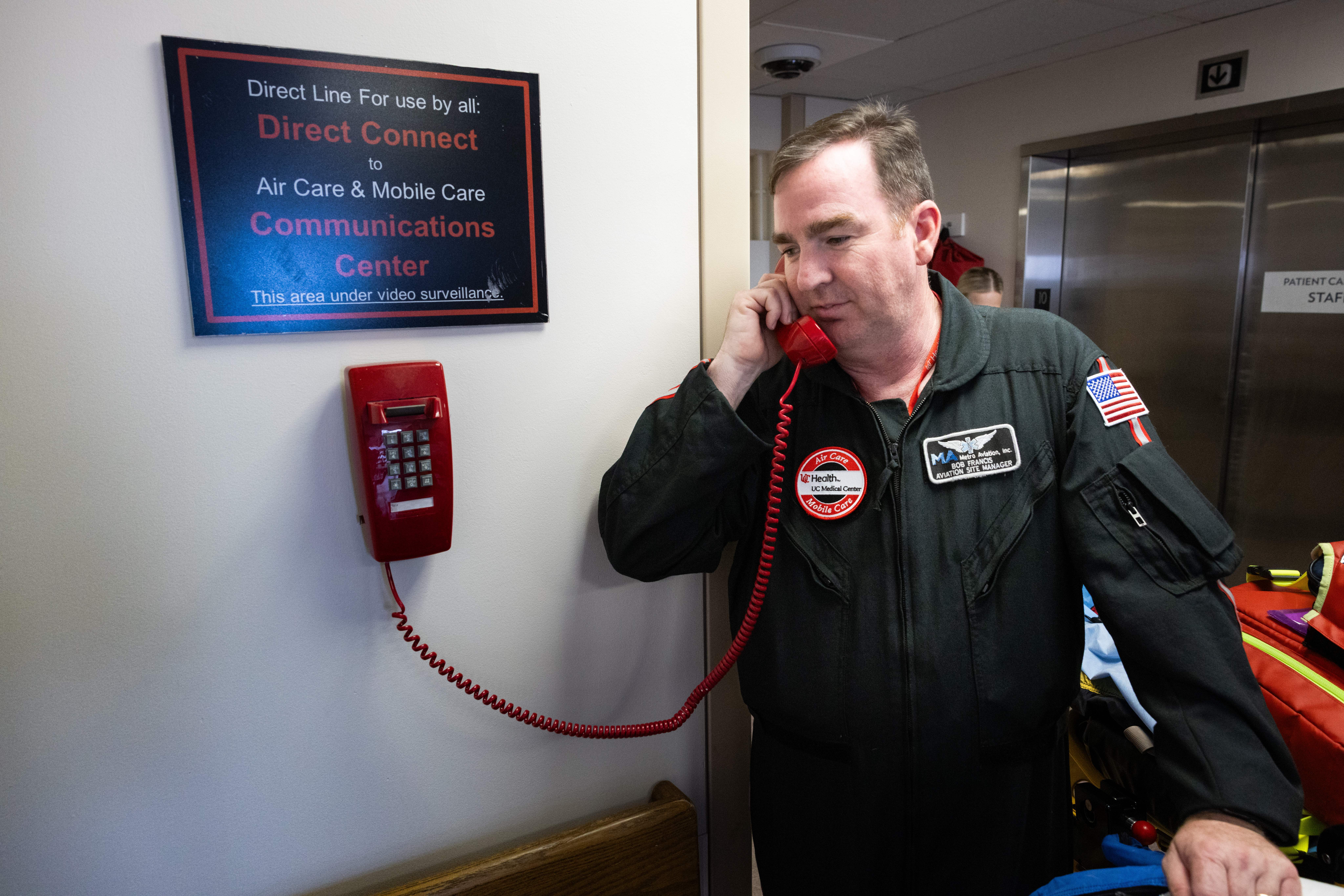 Air Care pilot on the phone with our communications center team.