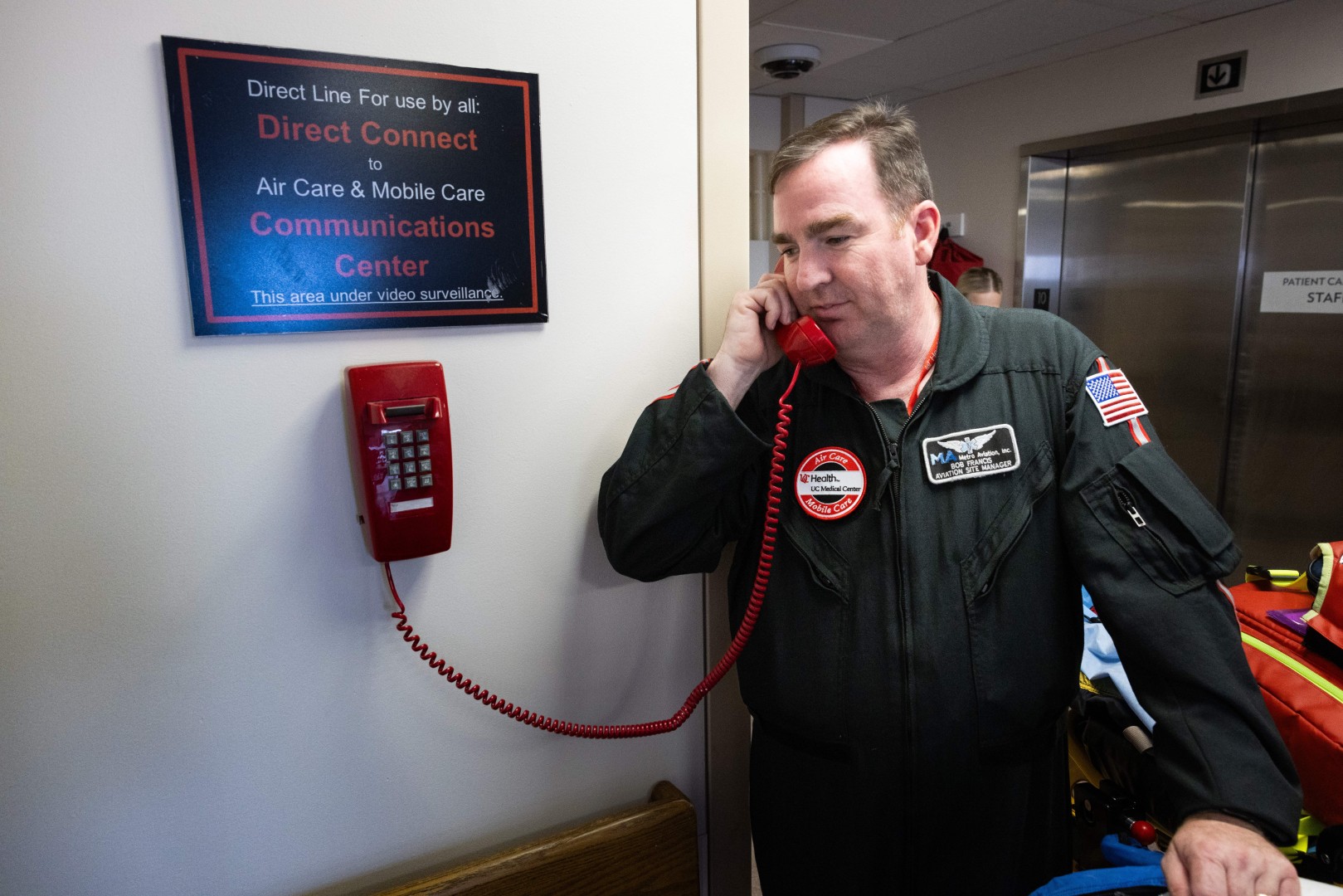 Air Care pilot on the phone with our communications center team.