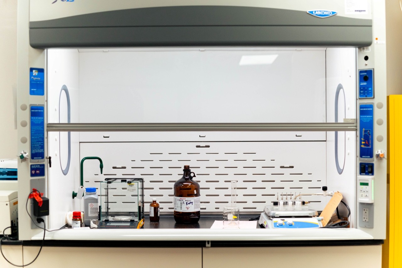 Lab materials against a wall backsplash.