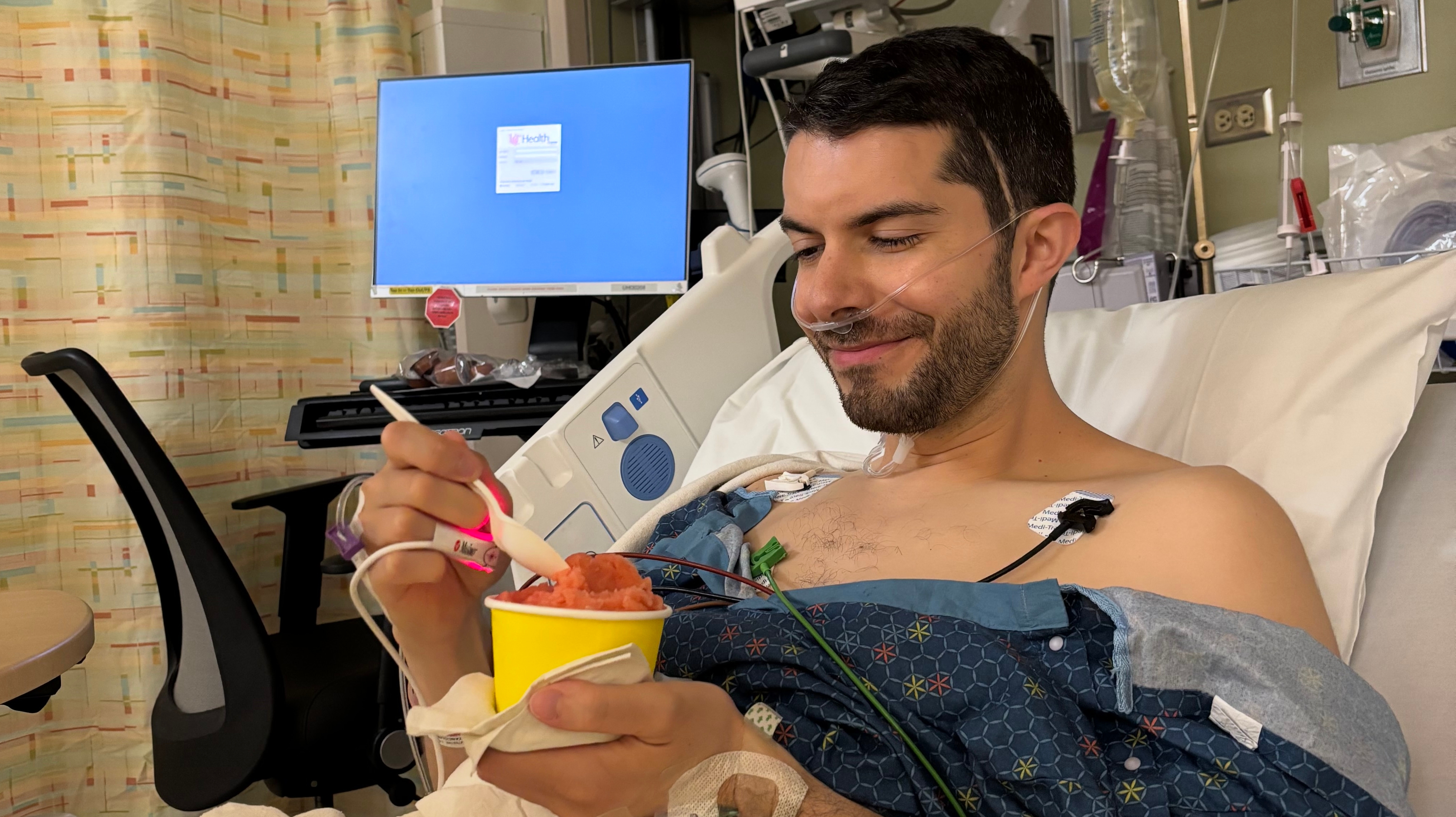 Danny enjoying his first liquid-based food, sorbet, post cTIF, symptom free in the recovery room