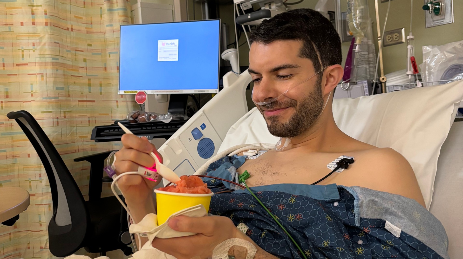 Danny enjoying his first liquid-based food, sorbet, post cTIF, symptom free in the recovery room