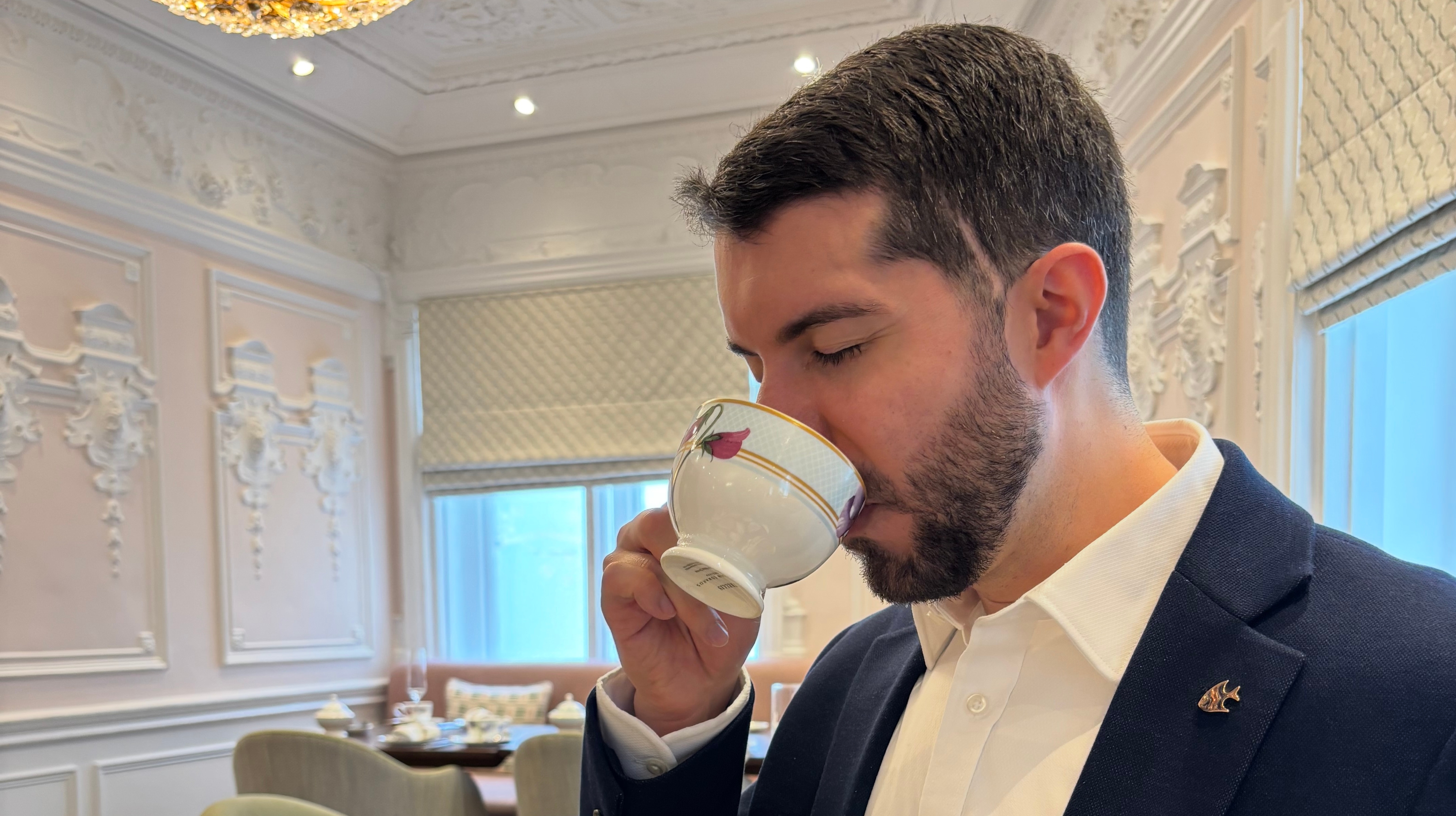 Danny enjoying a cup of coffee.