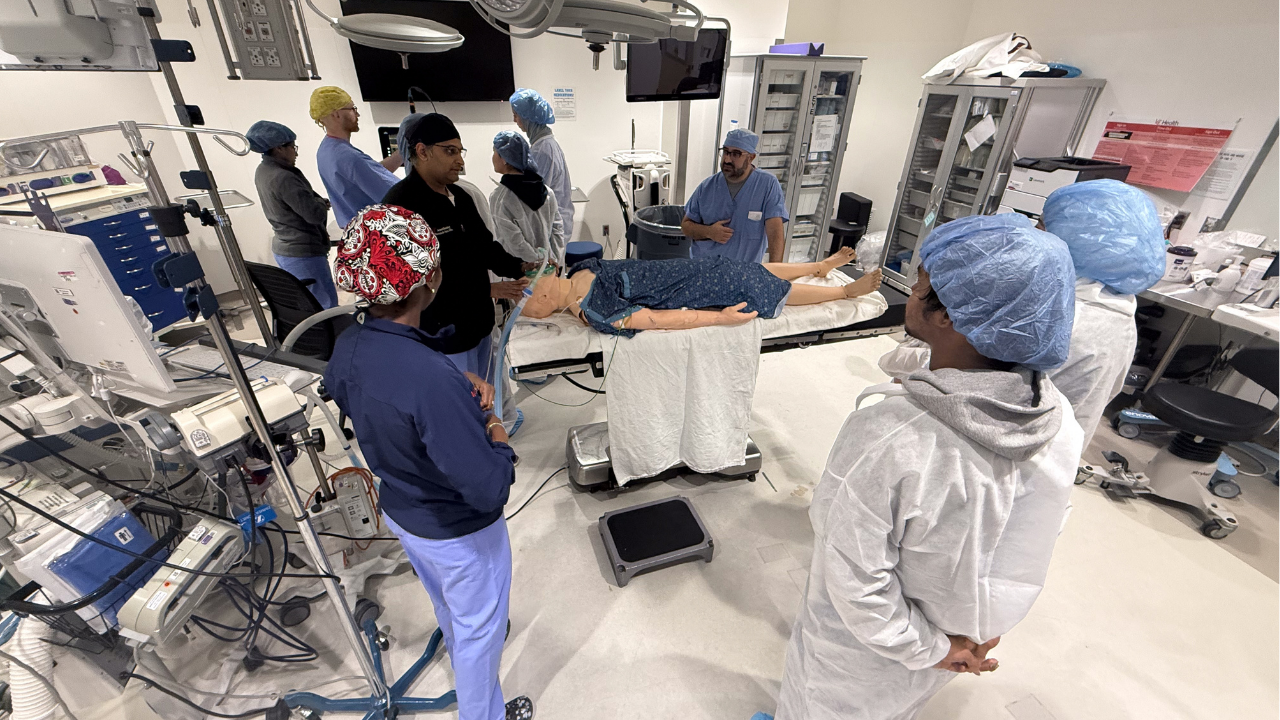UC Health team offers education and training in an operating room using a manikin