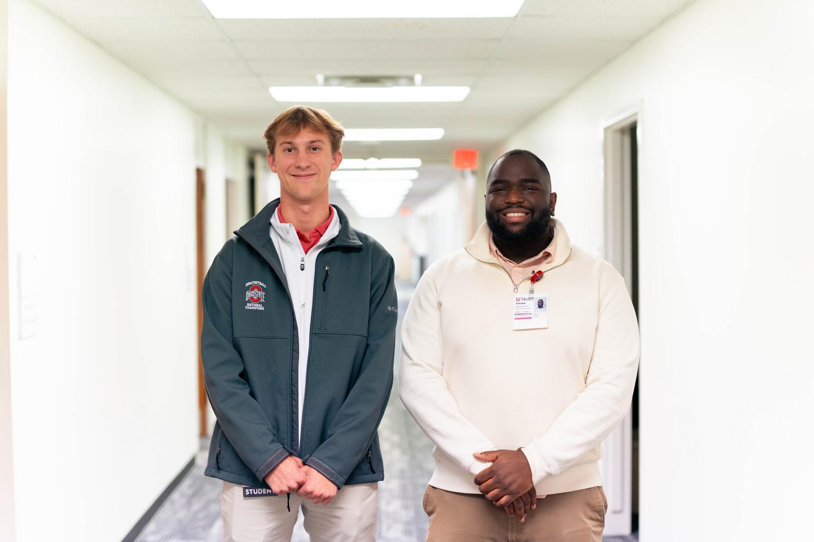 Two young men in hallway at medical center