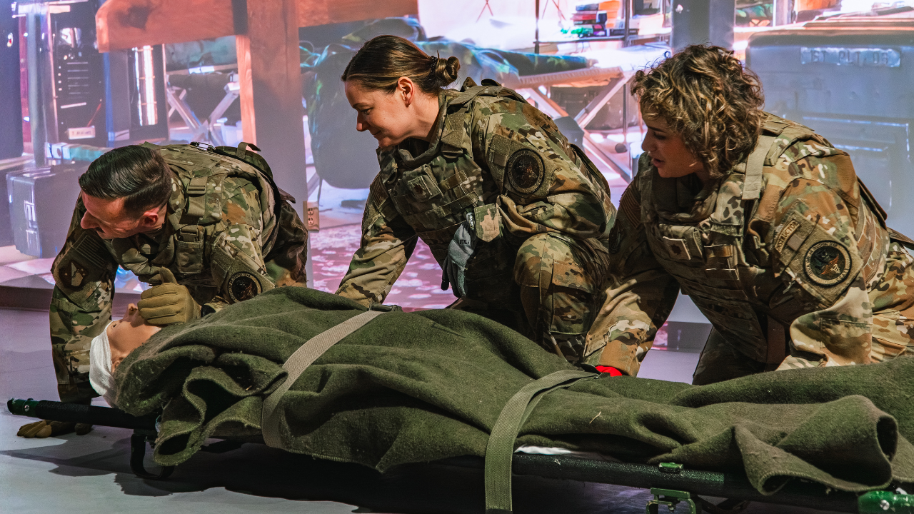 Air Force clinicians practice life-saving techniques on a life-like manikin at the UC Health DARRIO Simulation Center in Cincinnati, Ohio.