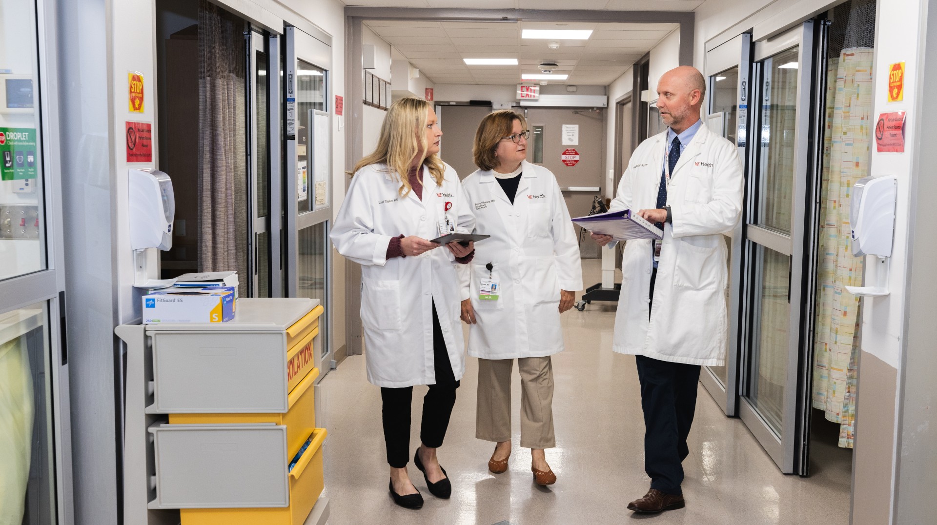 Burn team walking down the burn clinic hall way.