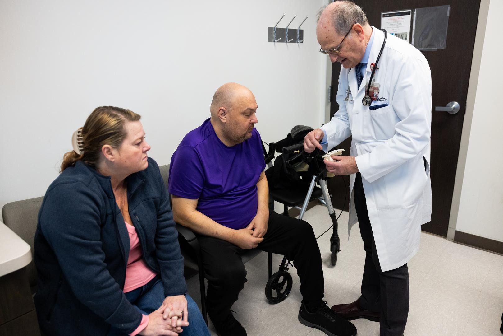 Physician talks with a patient. 