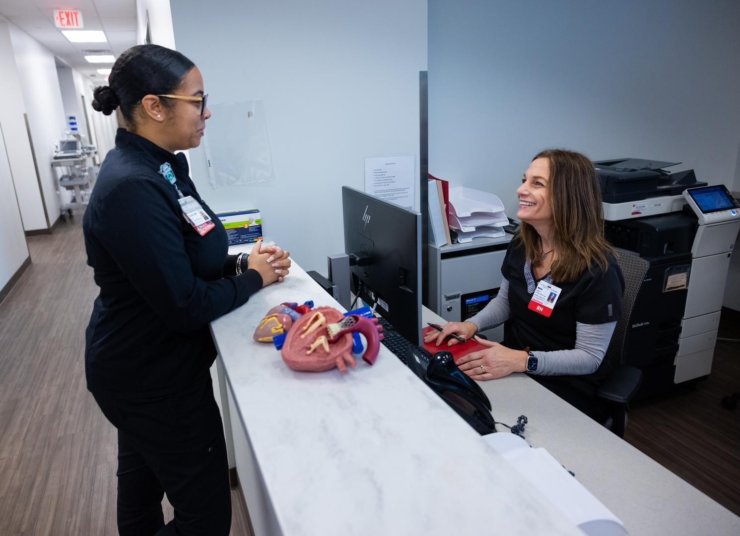 UC Health Cardiology team at desk