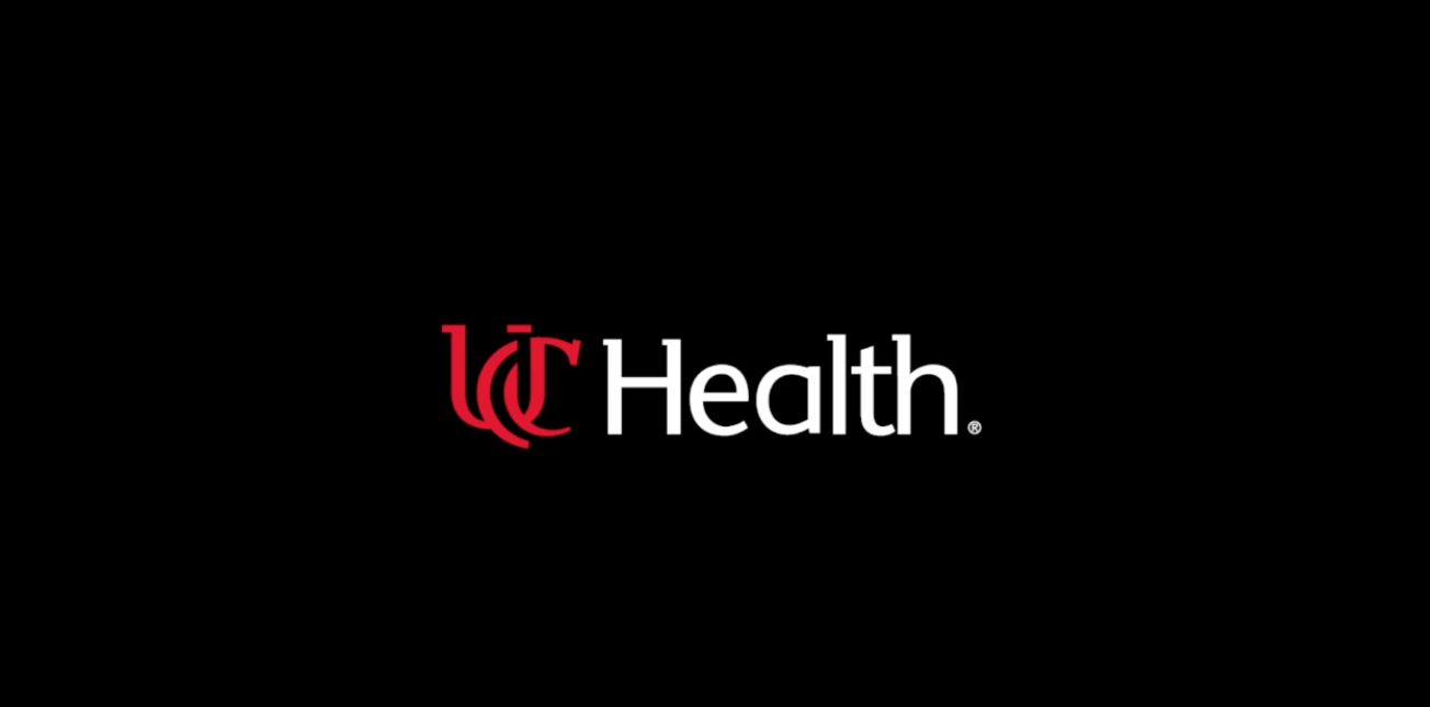 Logo for UC Health. Black background with red and white text.