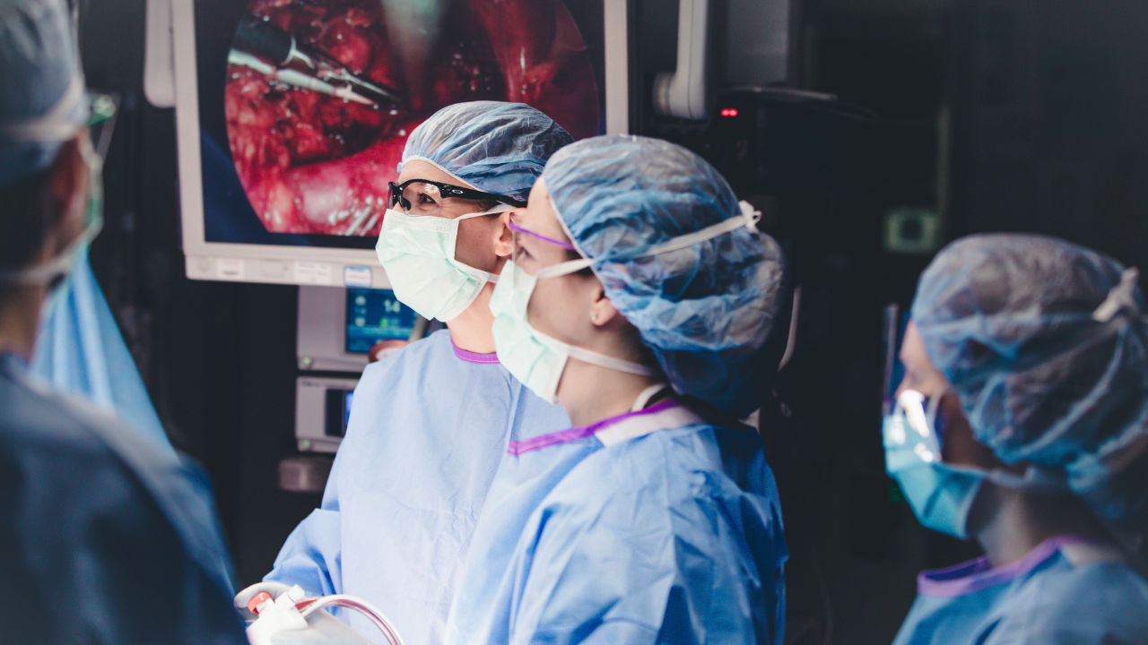 Dr. Makley at UC Health in the operating room with other care providers