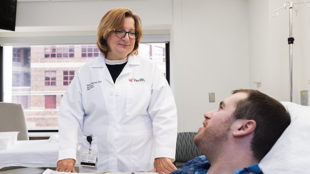Dr. Warner with a patient.