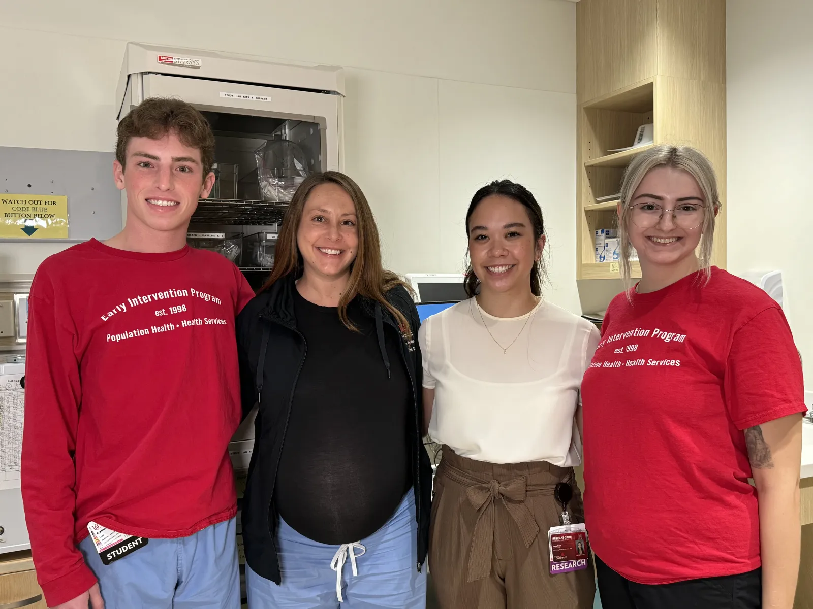 Dr. Pulvino with Early Intervention Program members, from left to right, Cameron May, Elysia Smith and Meghan Mays