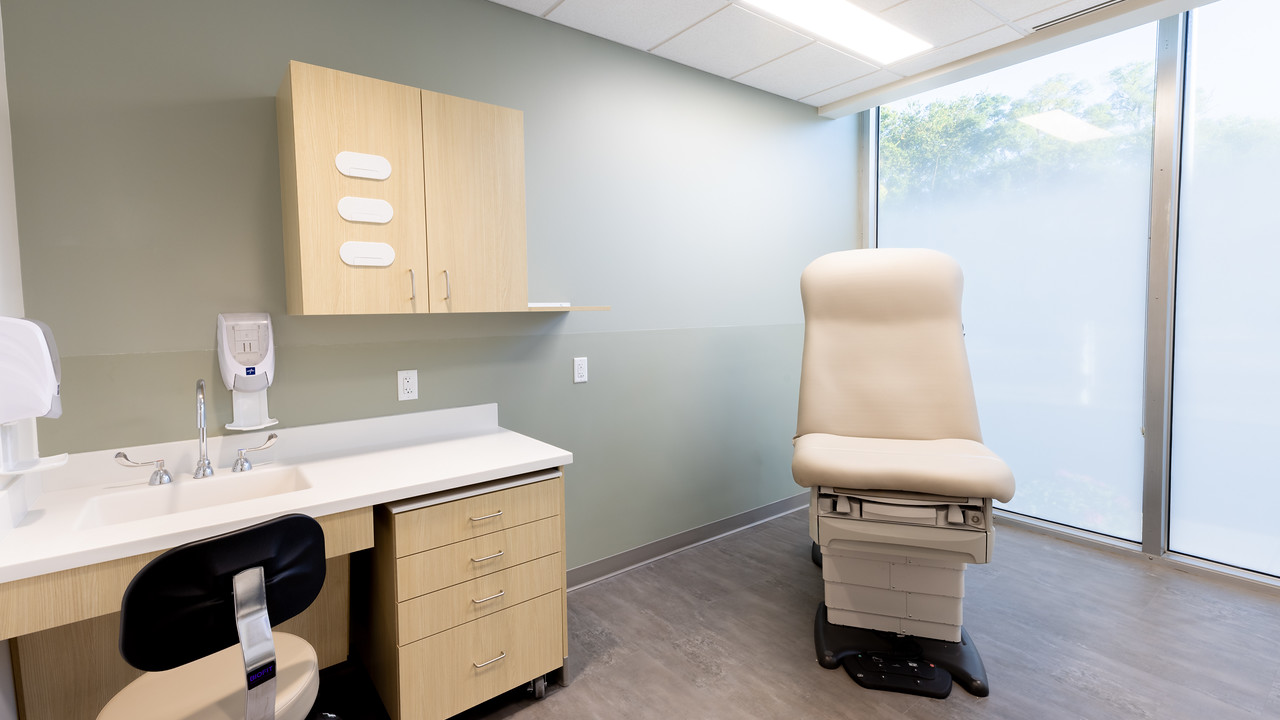 Exam room at the Freeman Center with natural light and adjustable exam tables