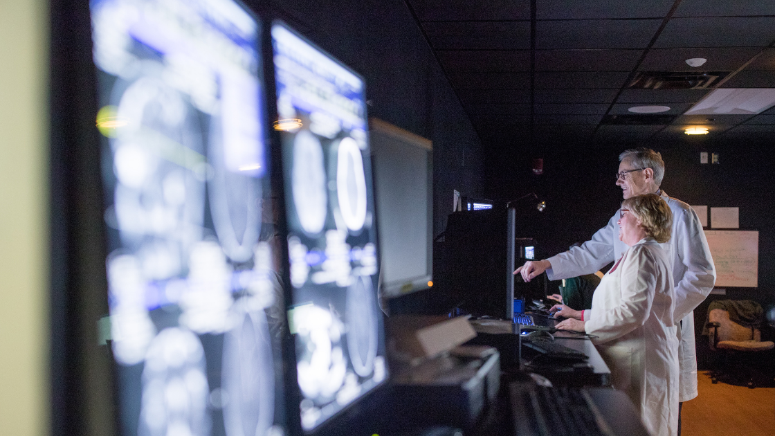 UC Physician's Reviewing Brain Scans of Alzheimer's Patients