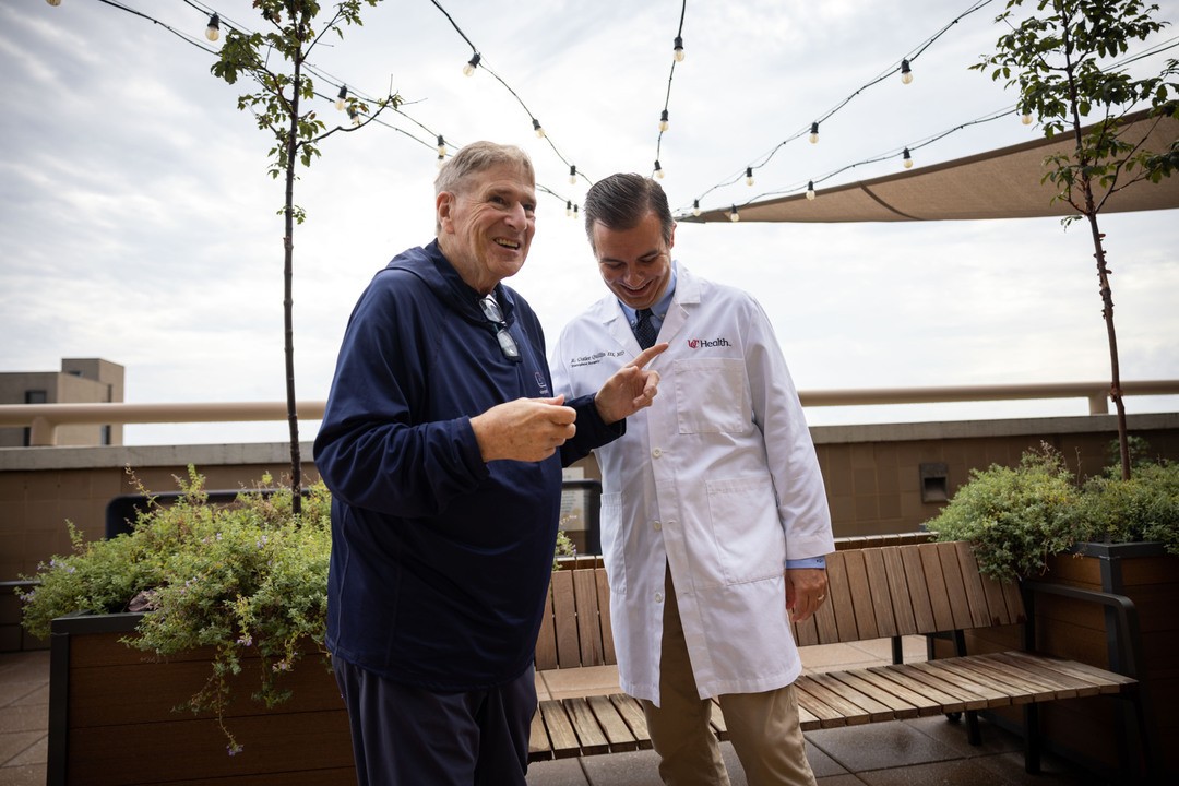 Bob Restaino and Cutler Quillin laugh together at UC Health in Cincinnati.