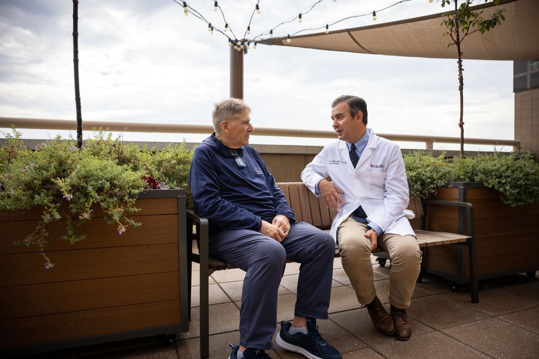 Bob Restaino and Dr. Cutler Quillin talk together outside at the University of Cincinnati Medical Center
