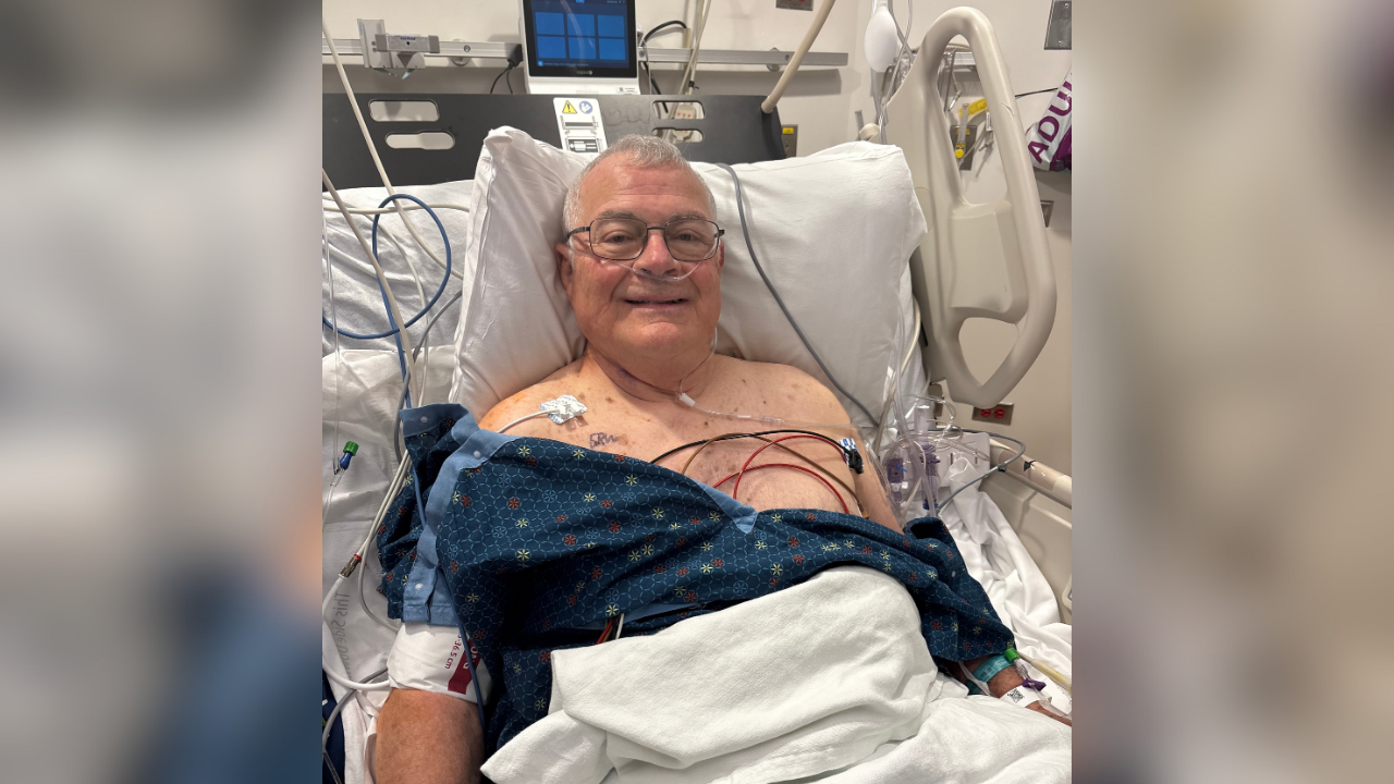 Dennis recovering after thoracic surgery in hospital bed