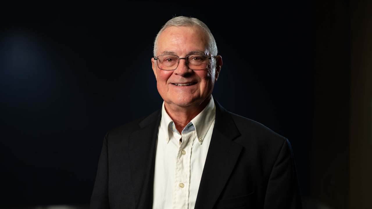 Portrait of Dennis Schmidt with black background
