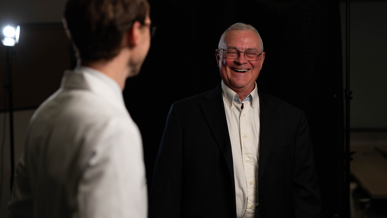 Dr. Van Haren and Dennis laugh together