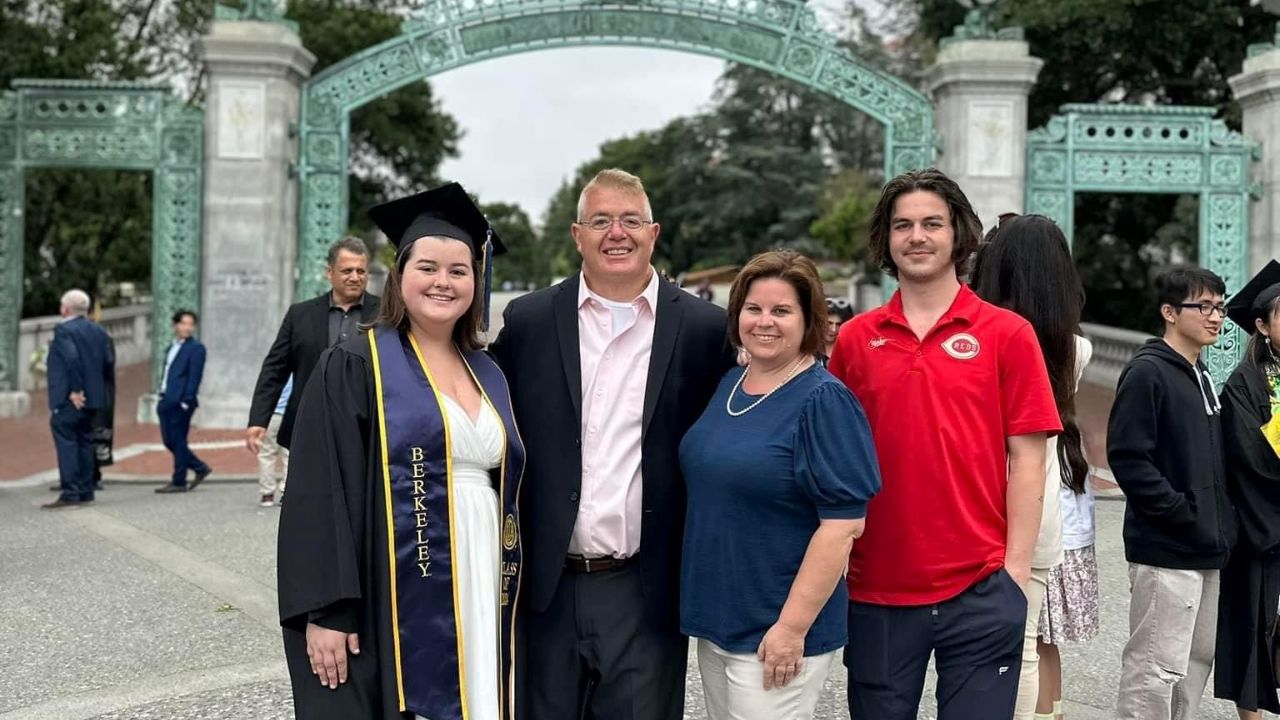 Hilary and his family at graduation