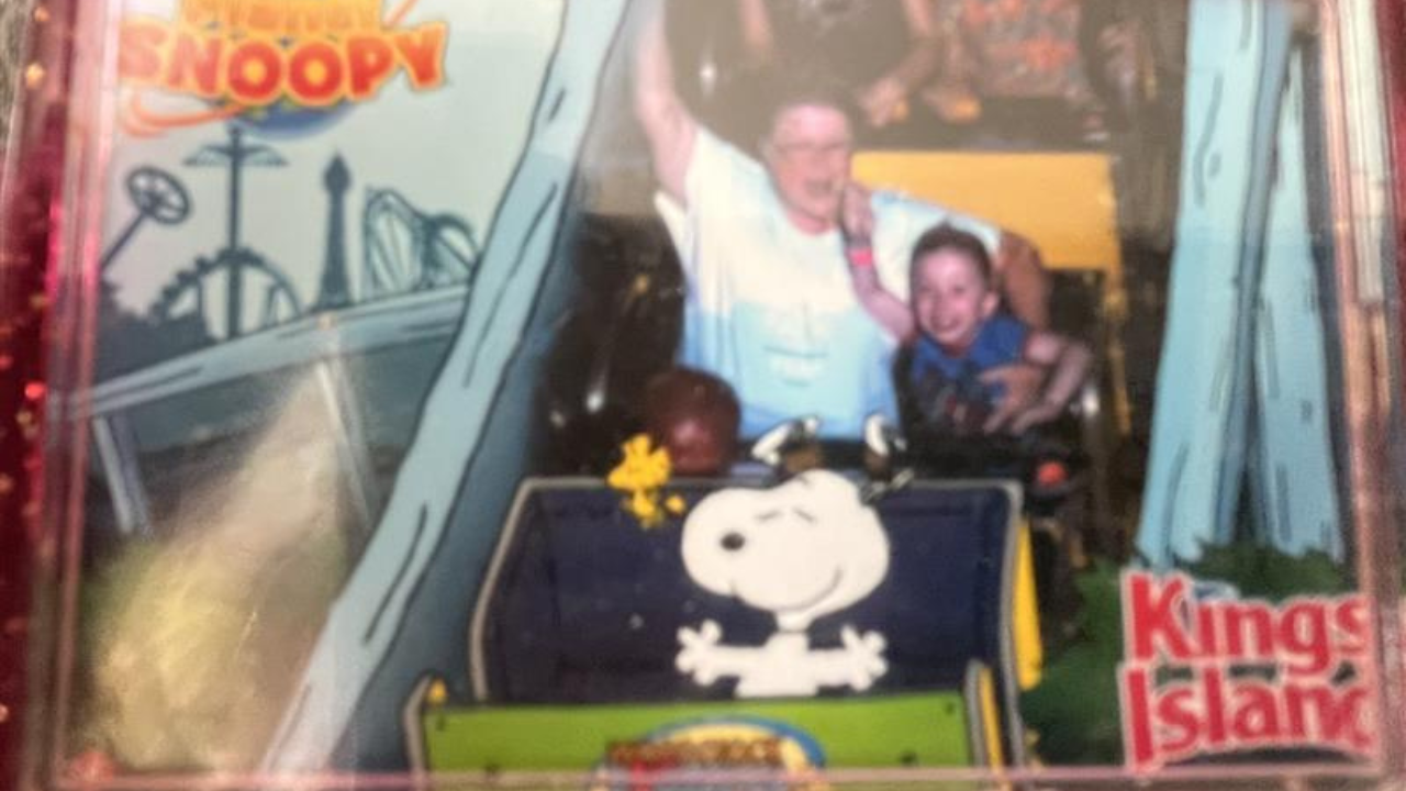 Judy Devor rides a rollercoaster with her grandson