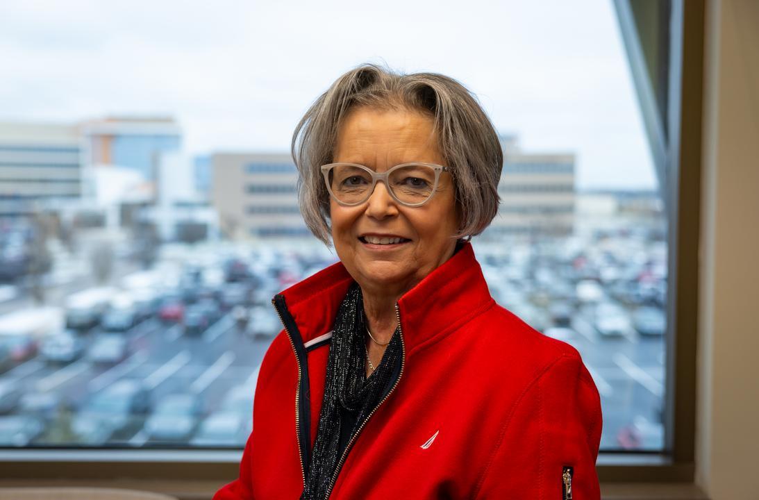 Judy Harvey at UC Health in Cincinnati, smiling for the camera