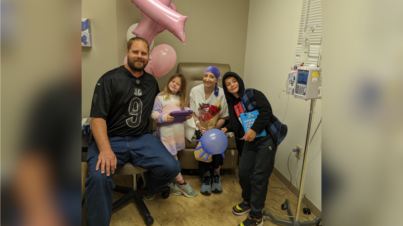 Mary and her family during a treatment.