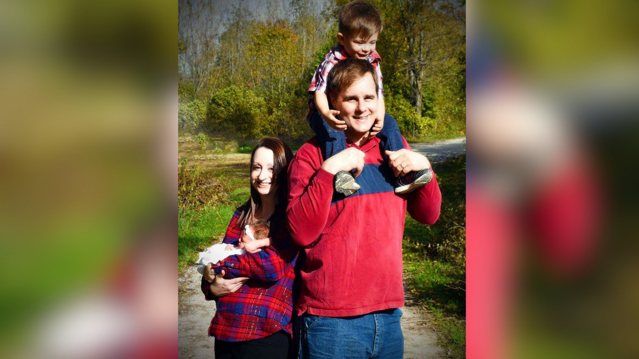 A family portrait of Mary, her husband and their two young children, taken shortly before her diagnosis.