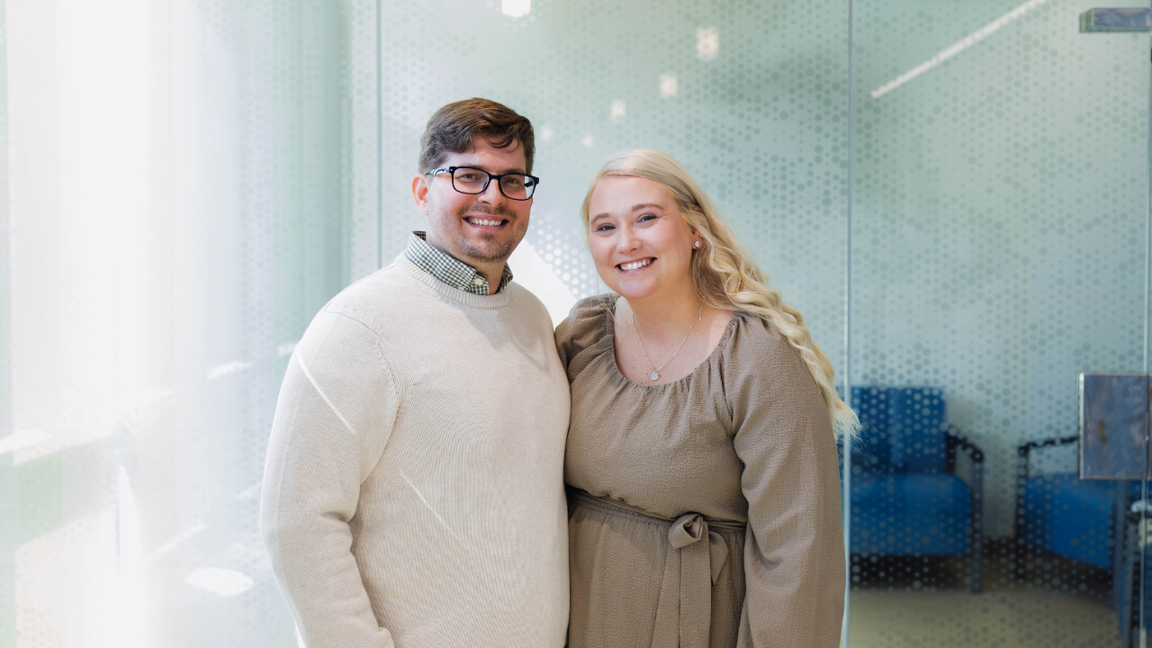 Jeremy and Hannah Maynard smile for a photo at UC Health in Cincinnati, Ohio