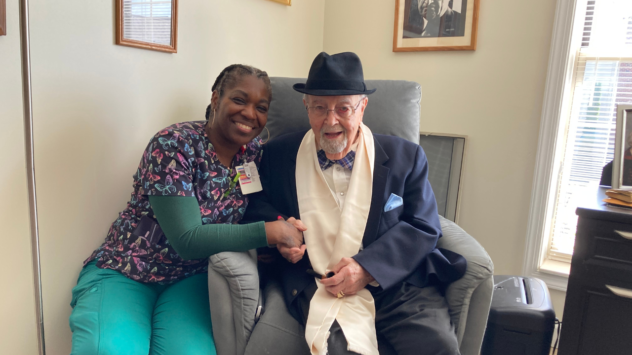 Resident Mike Ascolese and Melissa, a member of his care team, at Bridgeway Pointe in Cincinnati