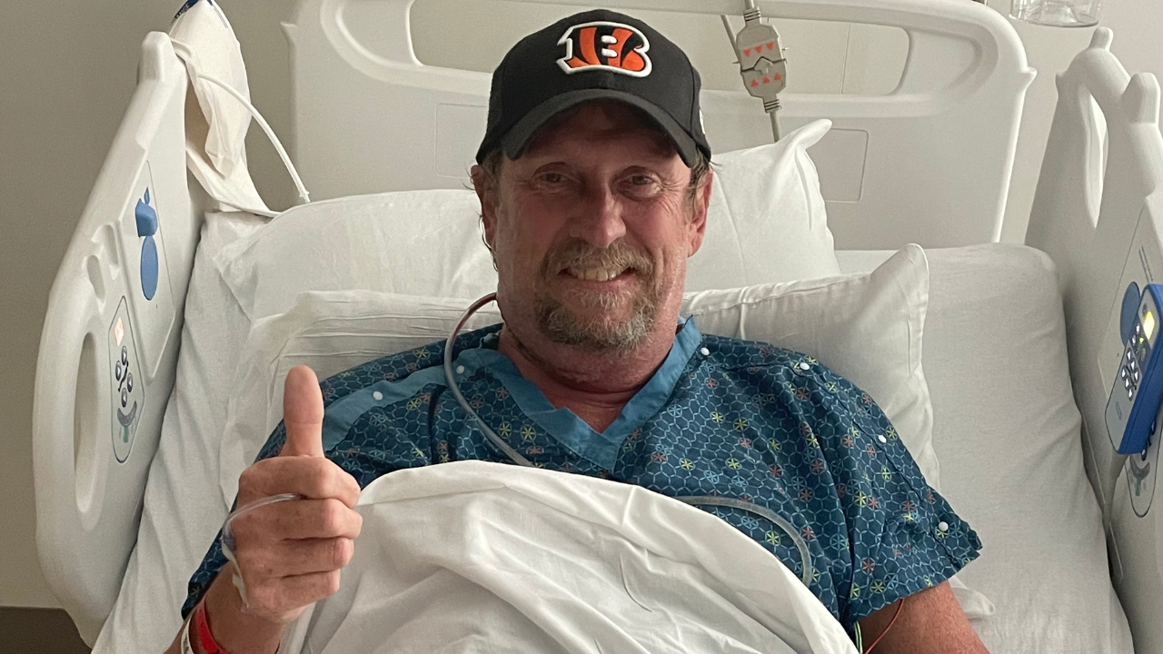 Steve in a hospital bed one day post-robotic surgery