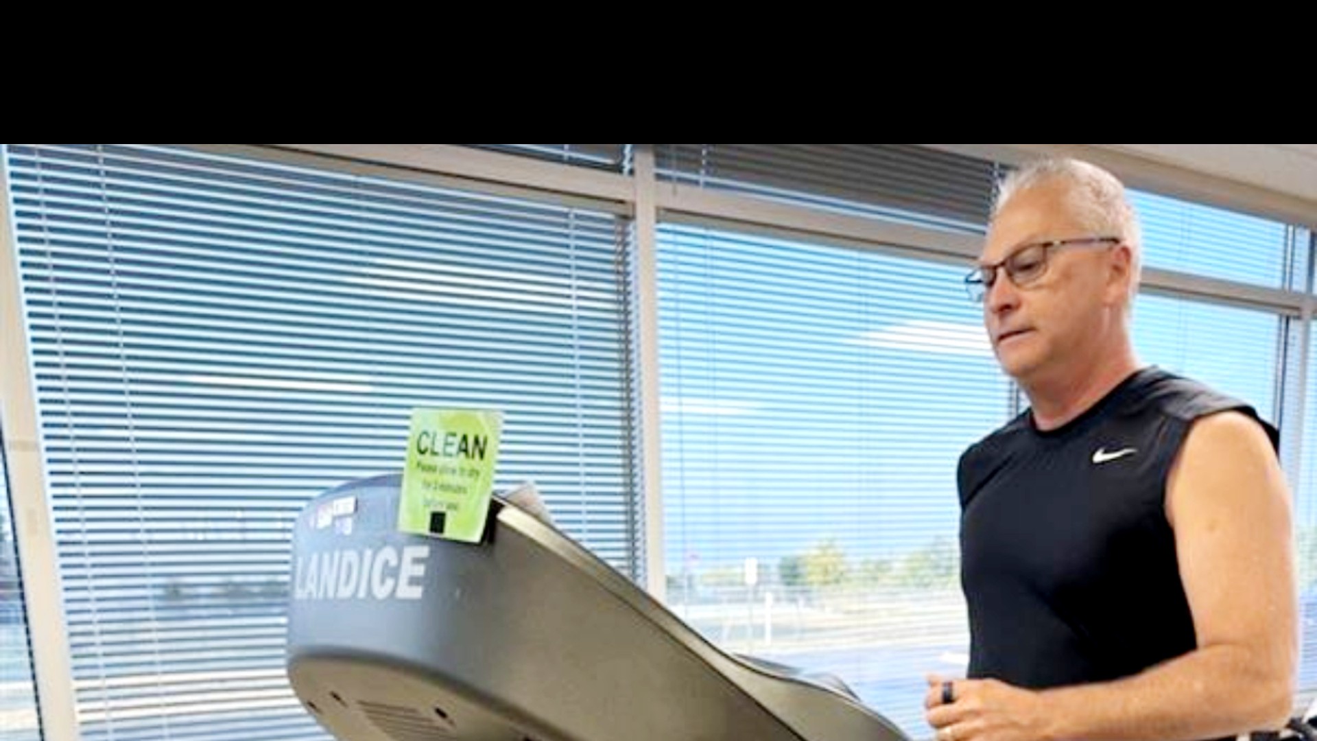 Steven exercises on a treadmill. 