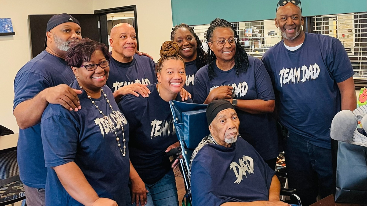 Theodore Mathis, surrounded by his support system