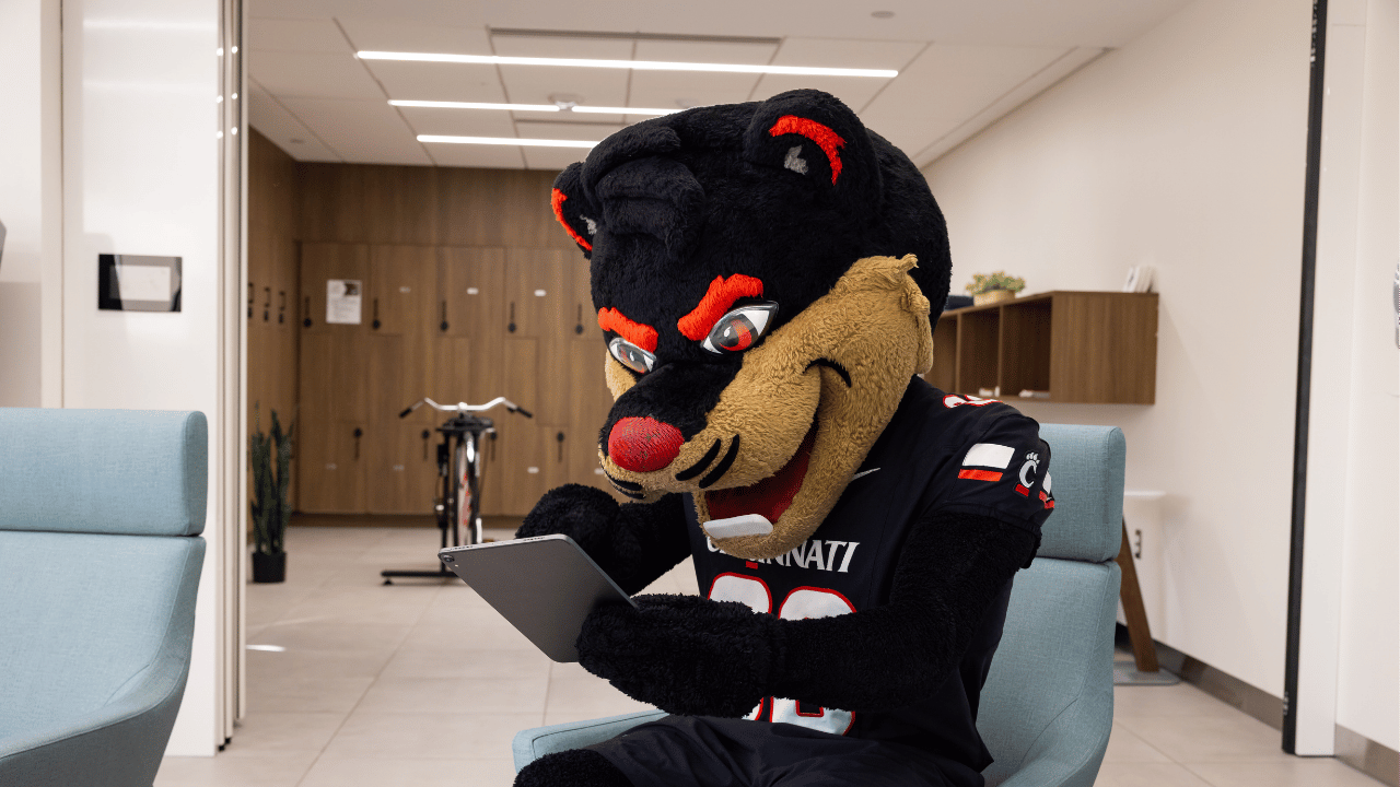 University of Cincinnati bearcat demonstrates the UC Cancer Center screening quiz