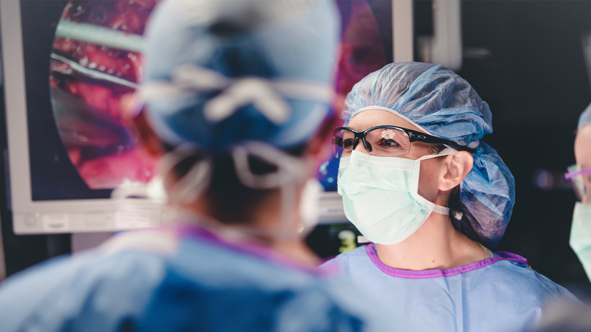 Care provider meets with a patient in medical setting