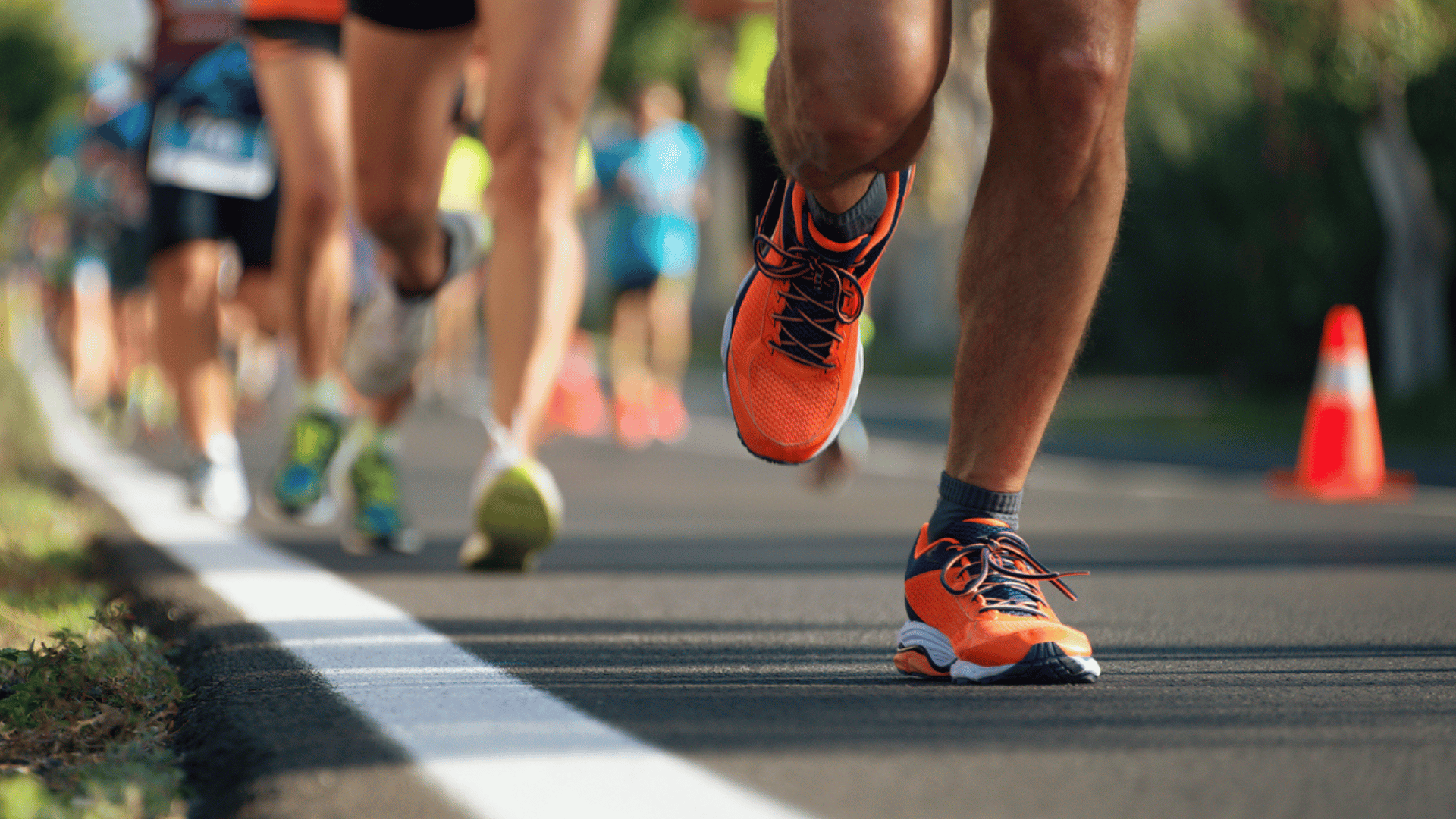 Close up of group of runners feet in a race