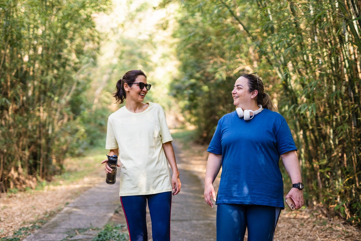 Women walking down a path outdoors