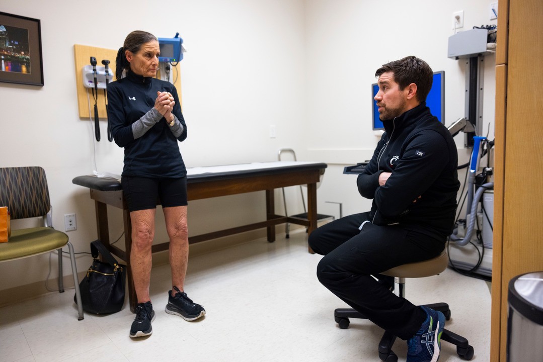 Jean and Dr. Bernholt meet in his office. 