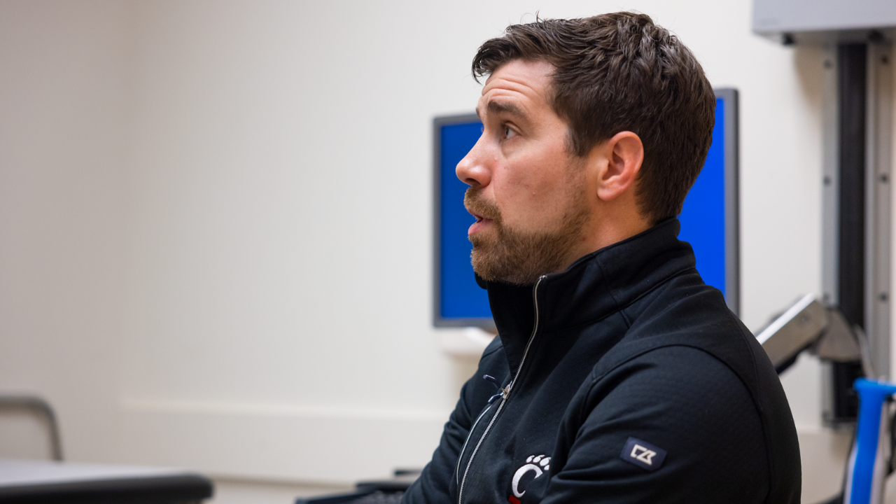 Dr. David Bernholt at UC Health meets with a patient in office visit