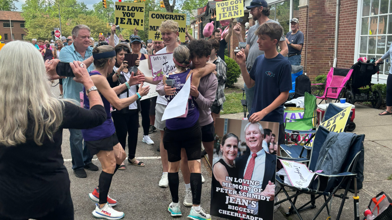 Jean is supported by family and friends on the race route.