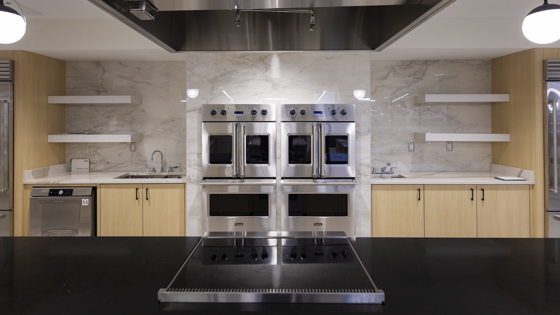 Inside Osher Wellness Kitchen in Cincinnati, Ohio, showing the professional appliances and bright work space.