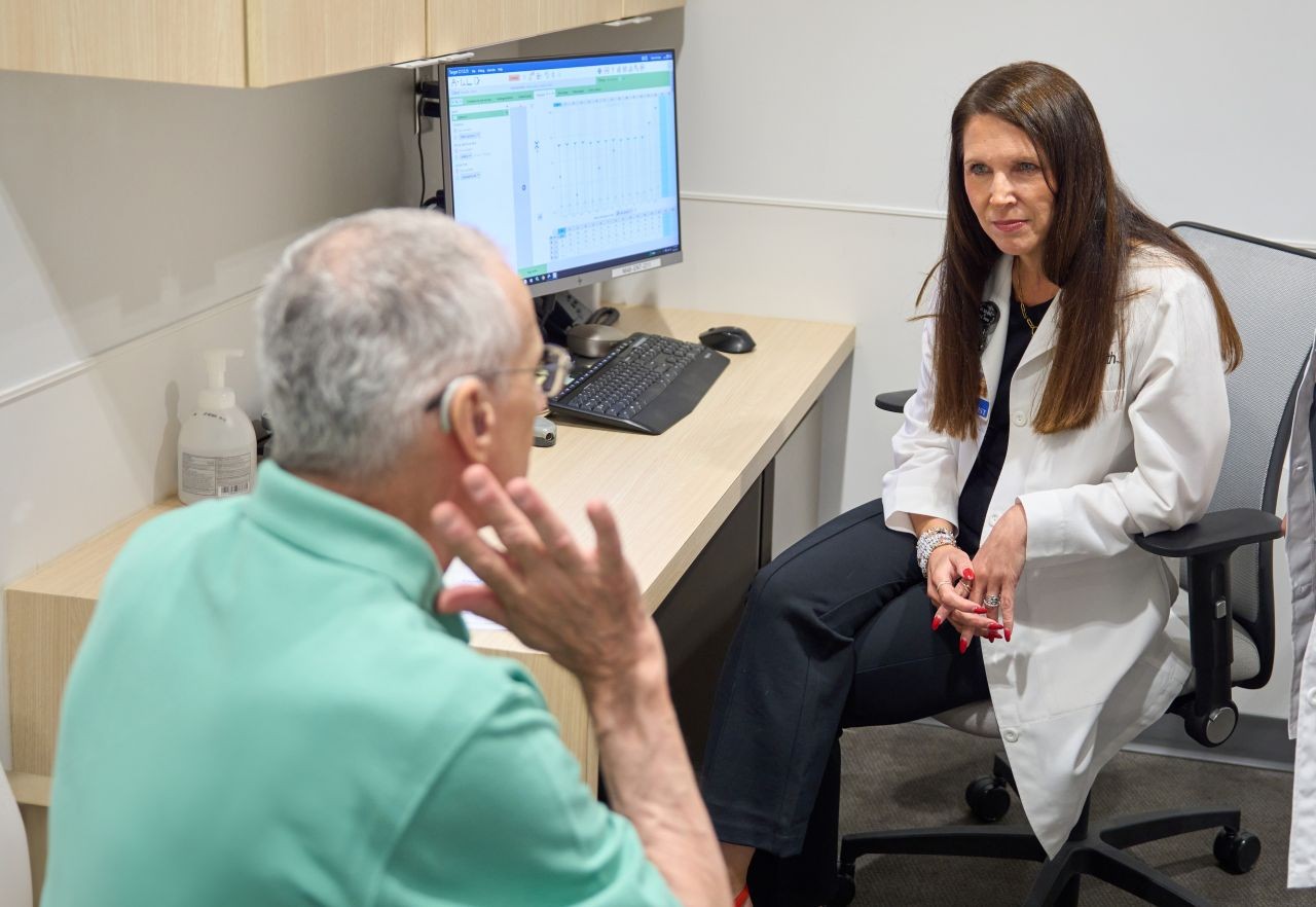 Physician meets with patient