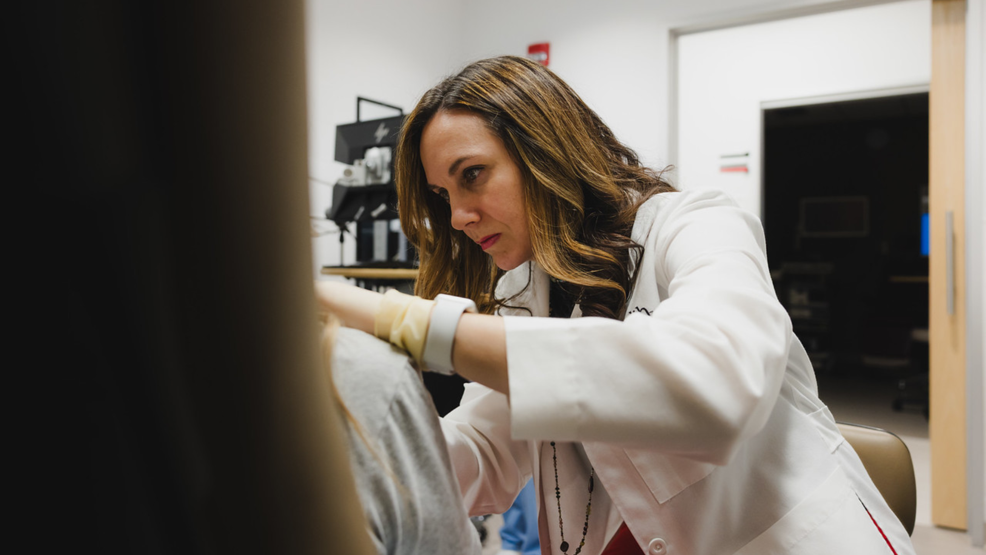 Physician performs airway treatment on patient at UC Health