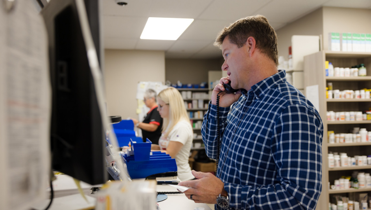 UC Health phamacist speaks to a patient over the phone