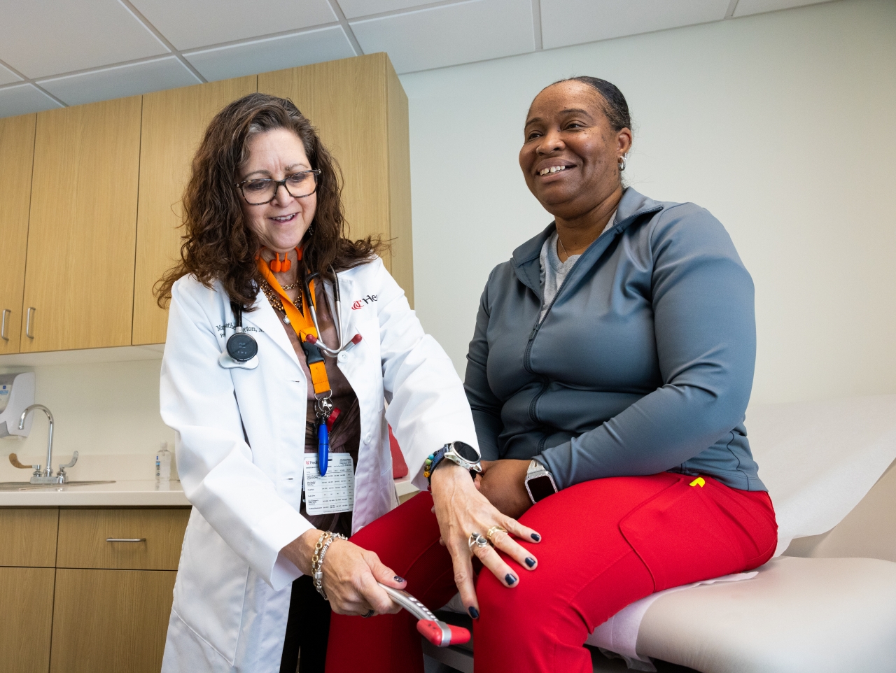 Medical provider talks with a patient. 