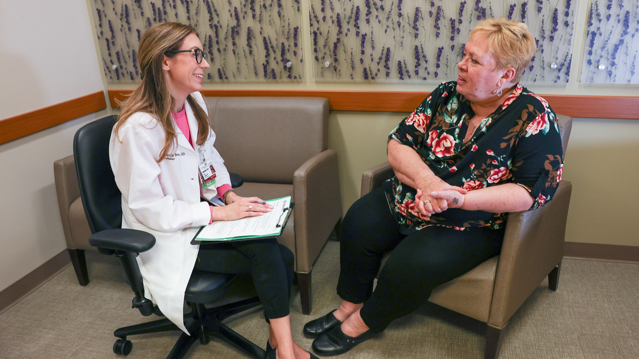 Dr. Ann Brown meets with a patient during an appointment