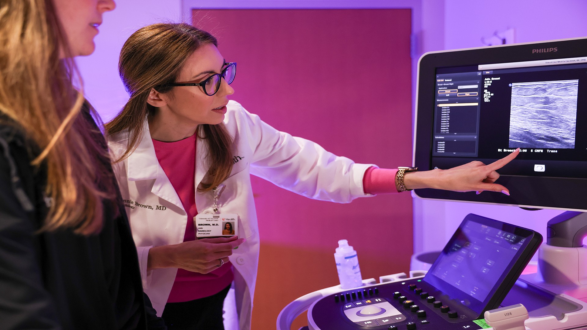 Dr. Brown reviews imaging during a breast ultrasound