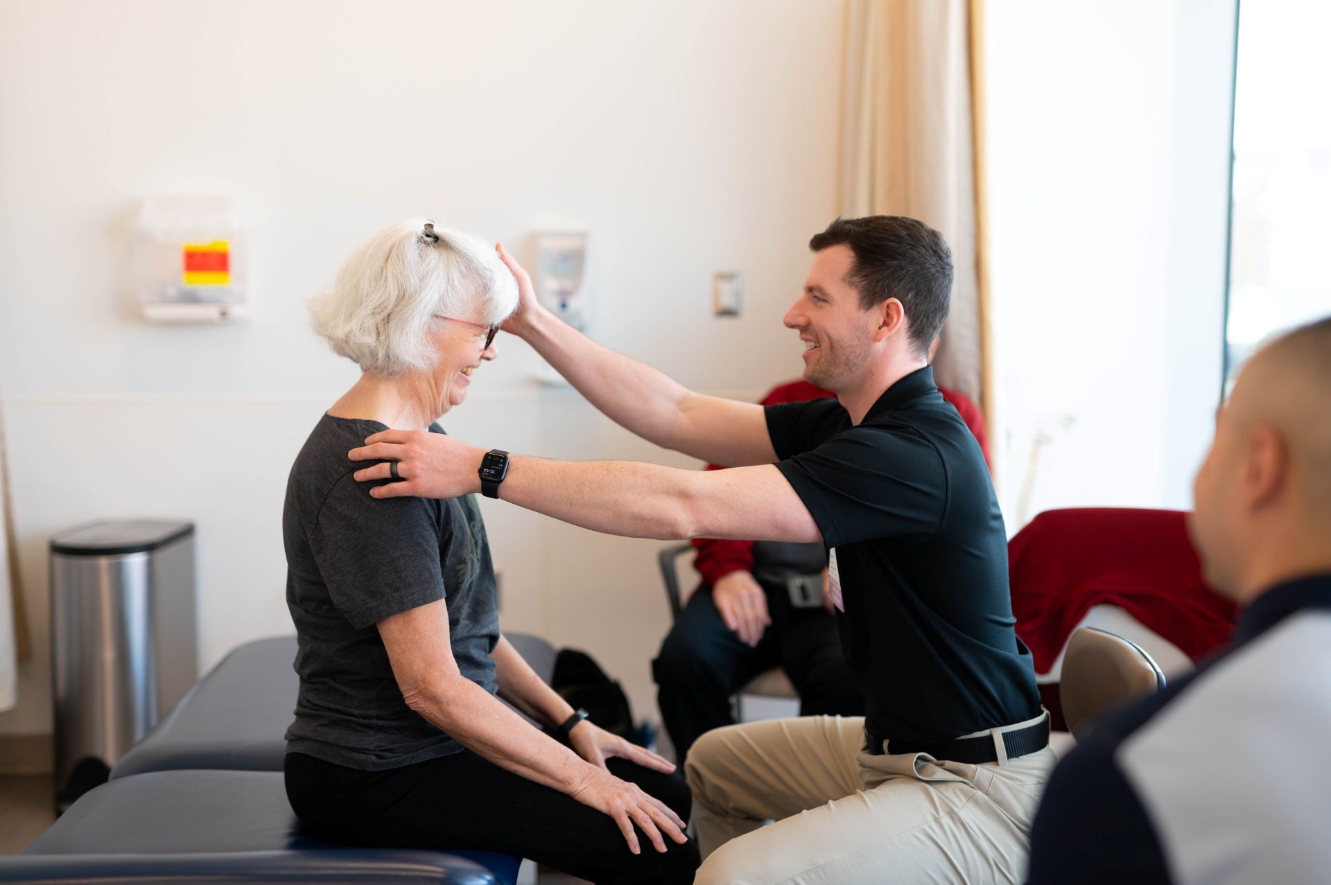 Physical therapist meeting with a patient
